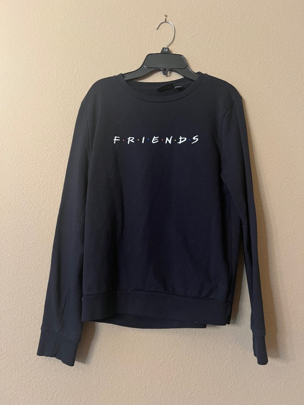 Friends black crewneck sweater.